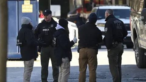 Search Continues for Brown University Mass Shooting Suspect