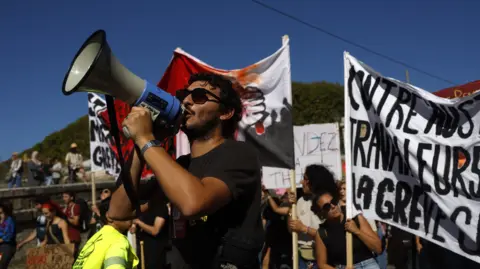 Nationwide Strikes Erupt in France Against Government Budget Cuts