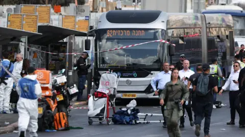 Tragic Shooting at Jerusalem Bus Stop Claims Six Lives