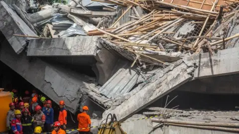 Tragic Collapse in Indonesian School Leaves Three Dead and Many Trapped