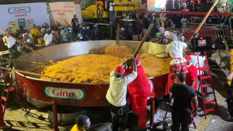 Hilda Baci Aims for Record with Enormous Pot of Jollof Rice in Nigeria