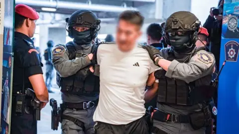 Thailand's Historical Extradition: She Zhijiang Linked to Scam City Sent to China