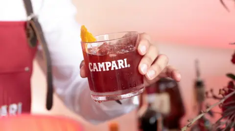 Italian Police Seize €1.3 Billion in Shares from Campari Owner Amid Tax Evasion Allegations
