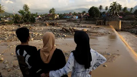 Desperate Search for Missing as Indonesia Faces Flood Devastation