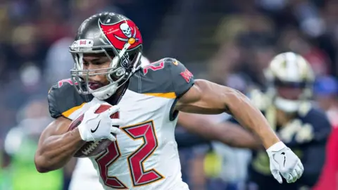 Tragic End for NFL Star Doug Martin: Dies in Police Custody at 36