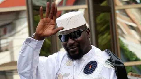 Controversial Election in Guinea: Junta Chief Claims Victorious Lead Amid Social Media Restrictions