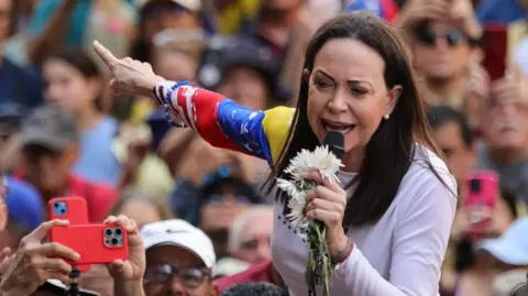 Venezuelan Opposition Leader Faces Fugitive Status Over Nobel Prize